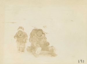 Image of Eskimo [Inuit] children sliding